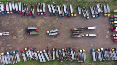 Aerial top down view to many parked trucks near to wheat depot in Burgas 스톡 동영상 320181155