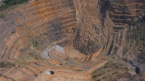 Aerial: Top down view of the Martha open cast mine in waihi, New Zealand Stock Footage 252313236