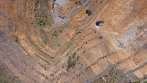 Aerial: Top down view of the Martha open cast mine in waihi, New Zealand Stockbeeldmateriaal 252313992