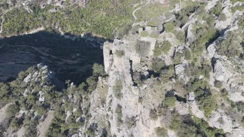 Aerial Top-Down View of Medieval Castle Ruins on Cliff Edge - 4K Stock Footage 331821443