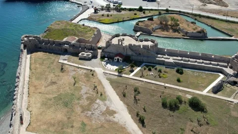 Aerial top down view of medieval island fortress surrounded by water Stock Footage 338104067