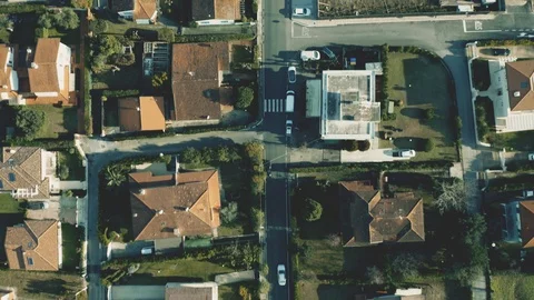 Aerial top down view of mediterranean villas with tiled sloped roofs Vídeos de archivo 104442920