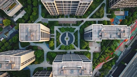Aerial top down view of modern residential area featuring greenery, water Stock Footage 311012811