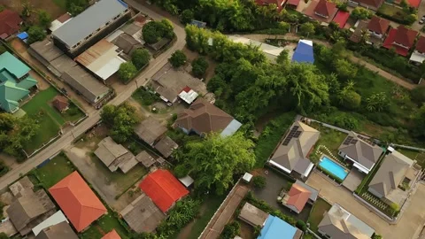 Aerial top down view of modern residential neighborhood and rural village Stock-Footage 335129437
