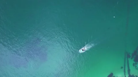 Aerial top down view of motorboat in turquoise sea The Concept of speed and.. Stock Footage 336096835
