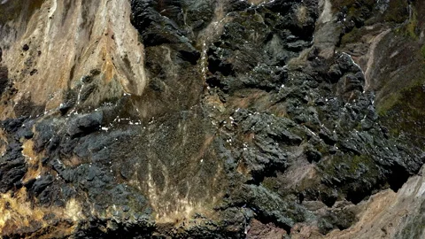 Aerial top down view of a mountain showing the many dangerous rocks Stock Footage 234949281