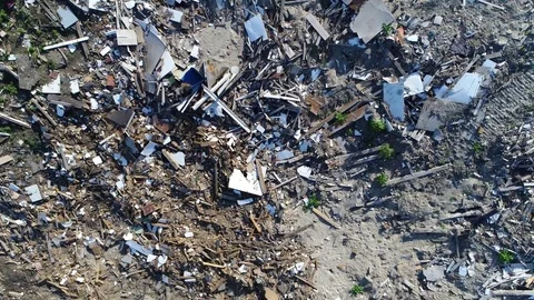Aerial top down view moving up above landfill site 4k Stock Footage 82622287