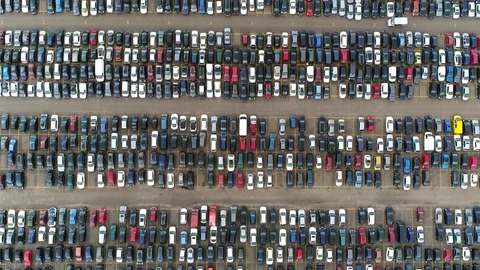 Aerial top down view moving over automaker car distribution lot 4k Stock Footage 119566463