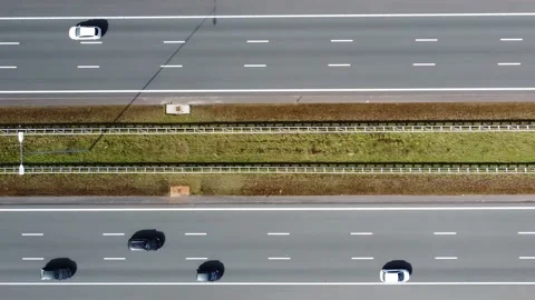 Aerial top down view moving left over three lane major highway 4k Stock Footage 152081162