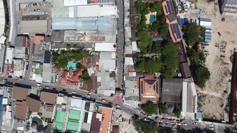 Aerial top down view moving backwards over Thai Patong Beach and Bangla Road 4k Stock Footage 257187039