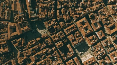 Aerial top down view of narrow streets, tiled roofs and squares in Florence Stock Footage 104073502