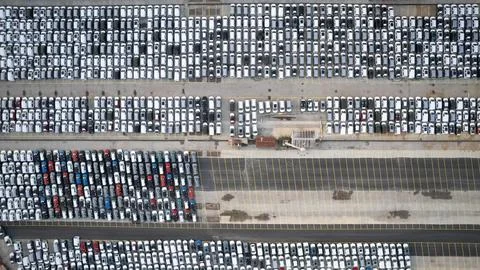 Aerial top down view of new cars parked at Haydarpasa port in Istanbul, Turkey Stock Photos