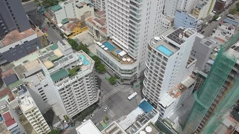 Aerial Top Down View of Nha Trang City. Drone zoom in above tall buildings with Stock Footage 128362846