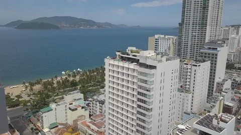 Aerial Top Down View of Nha Trang City. Zoom Out Bird eye view above tall Stock Footage 128363057