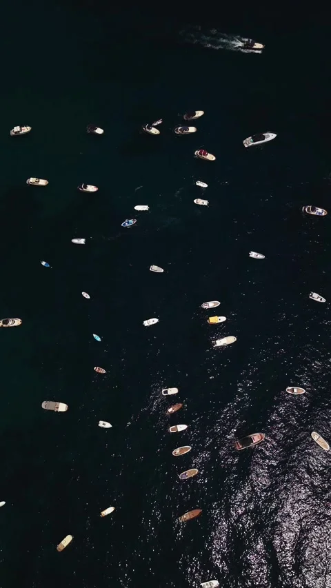 Aerial top down view of numerous boats and yachts sailing Stock Footage 340149691