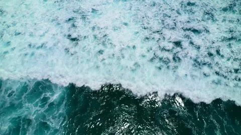 Aerial top down view of ocean waves crashing and foaming. Bali, Indonesia. Stock Footage 126997108