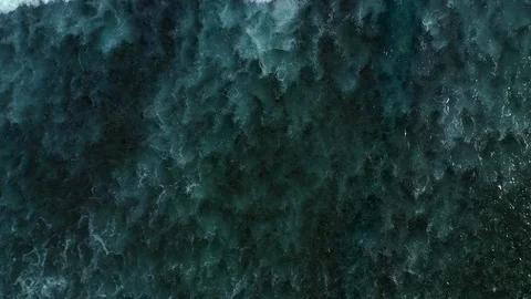 Aerial top down view of ocean waves crashing and foaming. Bali, Indonesia. Stock Footage 127000821