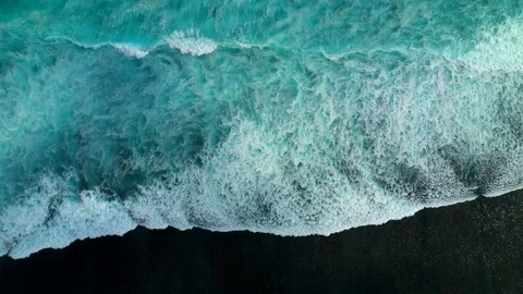 Aerial top down view of ocean waves crashing and foaming. Bali, Indonesia. Stock Footage 127005363