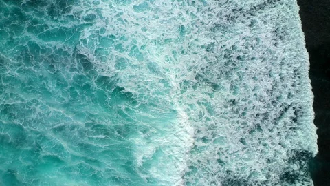 Aerial top down view of ocean waves crashing and foaming. Bali, Indonesia. Stock Footage 127005692