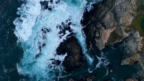 Aerial Top Down View of Ocean Waves Crashing On Rocks Stock Footage 172594134