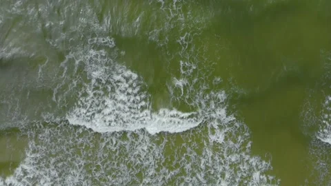 Aerial Top Down View of Ocean Waves Breaking on the Baltic Sea Shoreline in Pala Stock Footage 321752132