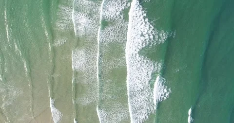 Aerial top down view of ocean waves breaking on shore The Concept of Rhythm Stock-Footage 331925450
