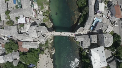 Aerial top down view of old medieval bridge (Stari Most), Neretva river, Bosnia Stock Footage 122559719