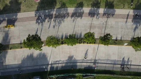 Aerial top down view of one person cycling on the street. Stock Footage 153357821