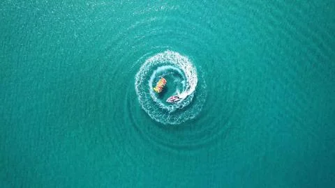 Aerial top down view os slalom made by speed boat on a Kayak sailing instruction Stock Photos