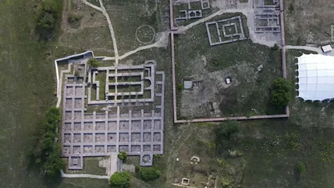 Aerial top down view of a outer town Pliska in Bulgaria, First Bulgarian Capital Stock Footage 136985022