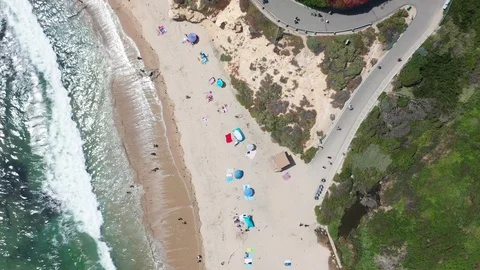 Aerial top down view over beach destination with sand and ocean water Stock Footage 111982772