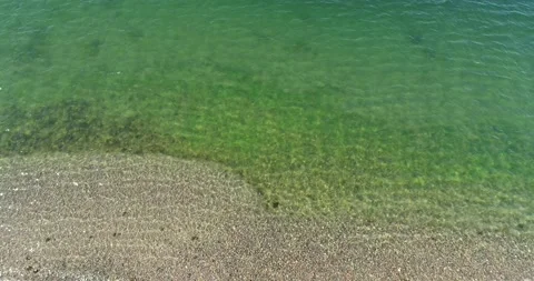 Aerial top down view over clear water. Stock Footage 135808762