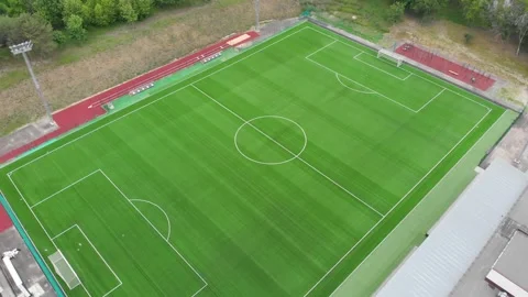 Aerial top down view over an empty soccer field. Stadium. Green court arena. Stock Footage 145223315