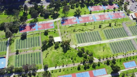Aerial top down view over many sport fields for soccer and basketball i Stock Footage 146352881