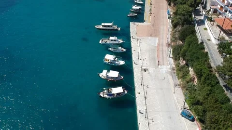 Aerial top down view over fishong boats in Patitiri, in Alonissos island, Spo Stock Footage 166011911