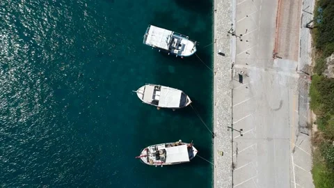 Aerial top down view over fishong boats in Patitiri, in Alonissos island, Spo 스톡 동영상 166014184