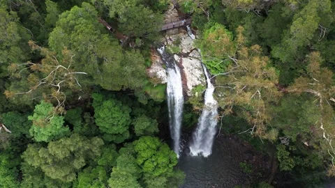 Aerial top down view over Twin Falls, with a fly out to reveal surrounds Stock Footage 261173883