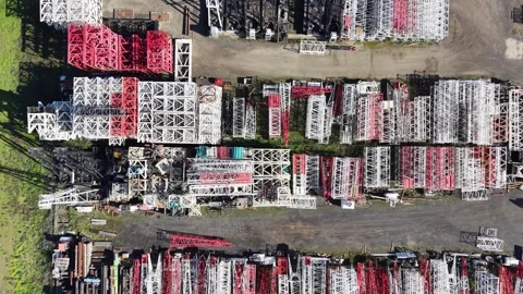 Aerial top down view over stored construction crane parts Video stock 341918490