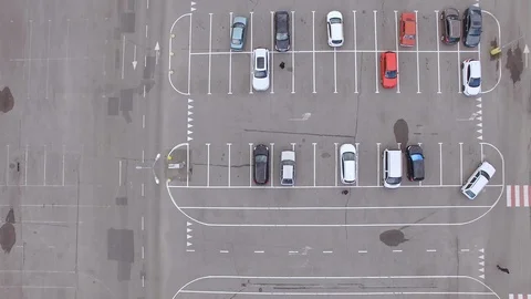 Aerial top-down view of parking lot near city mall Stock Footage 91289077