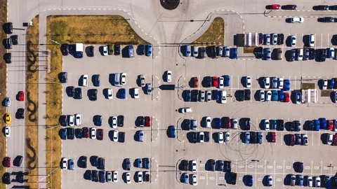 Aerial top-down view of parking lot near city mall. Stock Footage 107222528