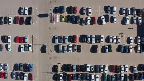 Aerial top-down view of parking lot near city mall. Stock Footage 107222791