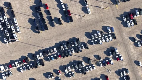 Aerial top down view of a parking lot full of new cars at a car manufacturer Stock-Footage 339264788