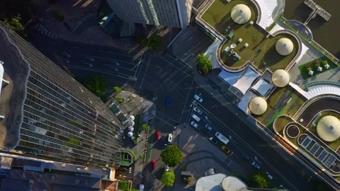 Aerial top-down view of Passing Cars on Eagle Street intersection next to Stock Footage 158275078