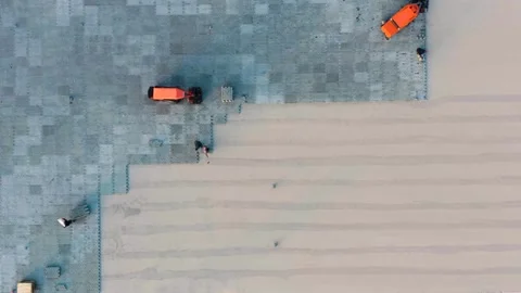 Aerial Top Down View of Paver Laying Machines Installing Interlocking Blocks Vídeo Stock 308605304