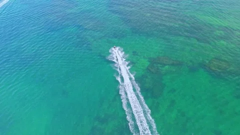 Aerial Top-Down View of personal waterfrafts on Turquoise Ocean Water Vídeo Stock 327889180