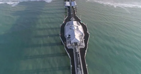 Aerial top down view of the pier and the beach in Brighton, Southern England Stock Footage 80216800