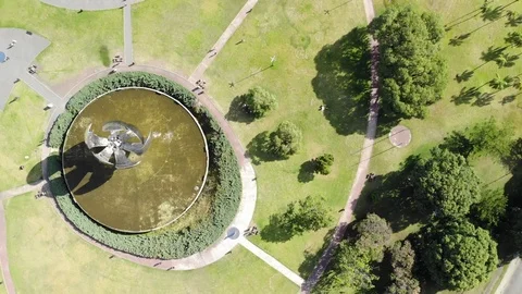 Aerial top down view of Plaza de las Naciones Unidas and Floralis Generica Stock Footage 126503309