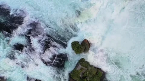Aerial Top-Down View of Powerful Waterfall Crashing on Rocks - Cinematic Nature. Stock Footage 322954100