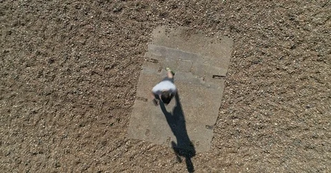 Aerial top down view of a professional boxer training on a beach Stock Footage 80669867