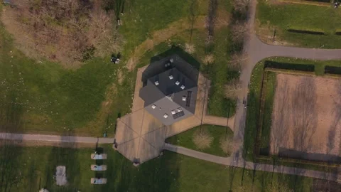 Aerial Top Down View of Public Facility Building With Rooftop Solar Panels Stock Footage 335651752